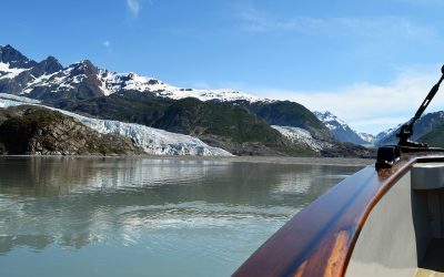 Alaska-here-we-come looking over the side of a boat