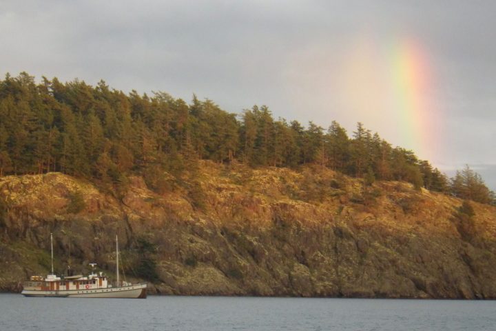 a small boat in a large body of water