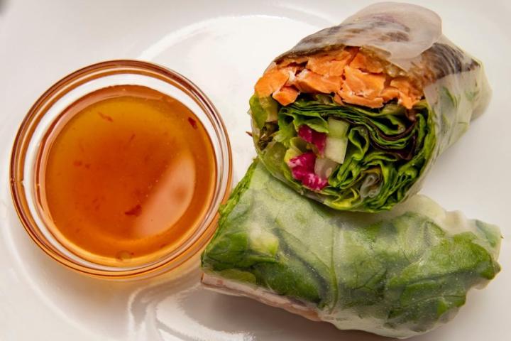 a plate of food with a sandwich and a cup of coffee