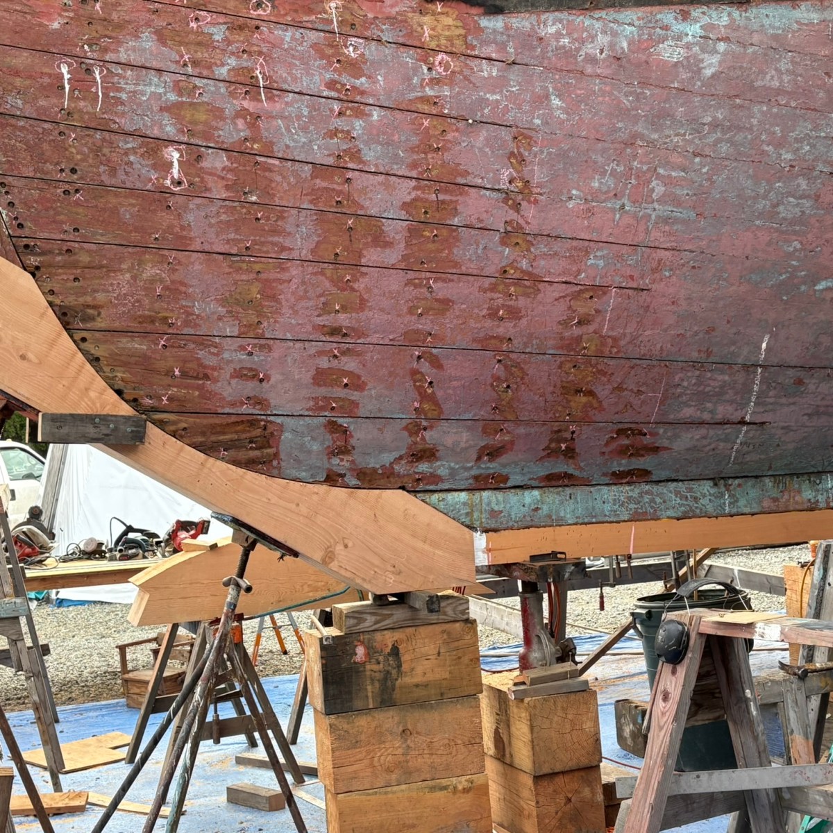 a chair sitting in front of a brick building