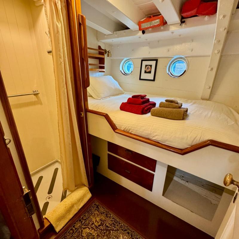 a room with a sink and a mirror