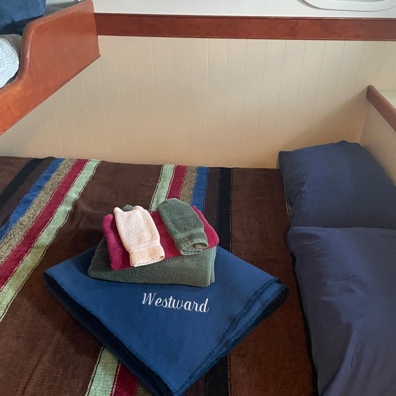 a bedroom with a blue blanket